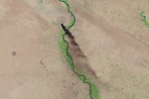 Landsat data courtesy of the U.S. Geological Survey shows smoke rising from the Baiji refinery near Tikrit, Iraq